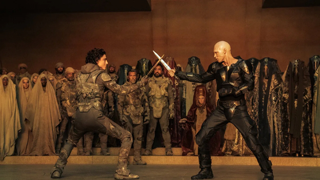 “May thy knife chip and shatter.” Timothee Chalamet’s Paul and Austin Butler’s Feyd Rautha face off in Dune: Part Two’s Climactic duel. Image Courtesy of Warner Bros. Pictures 